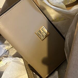 Donney and Bourke wallet for sale , minor damage you can see picture looks new .
